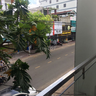 nhà 1 trệt 1 lầu mặt tiền đường Quang Trung